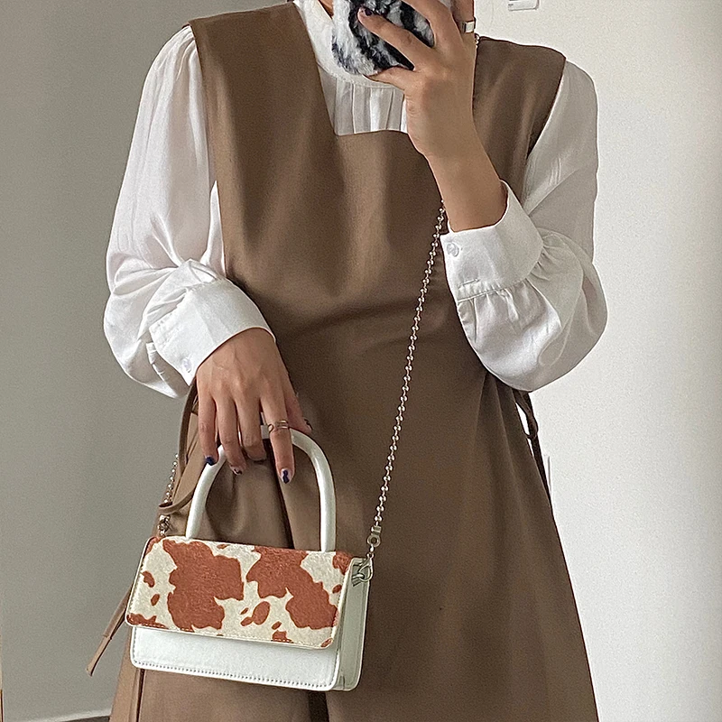 Нишевый дизайн кравешка модел коси верига диагонално чанта 2021 новото момиче ретро флип-надолу капачката чанта на едно рамо