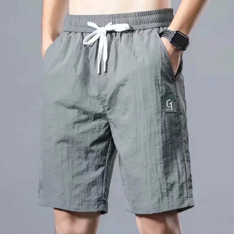 Къси панталони мъжки летни ледени копринени тънки напречно сечение тенденция на големи панталони свободна горна дреха ежедневни спортни плажни пятиточечные панталони